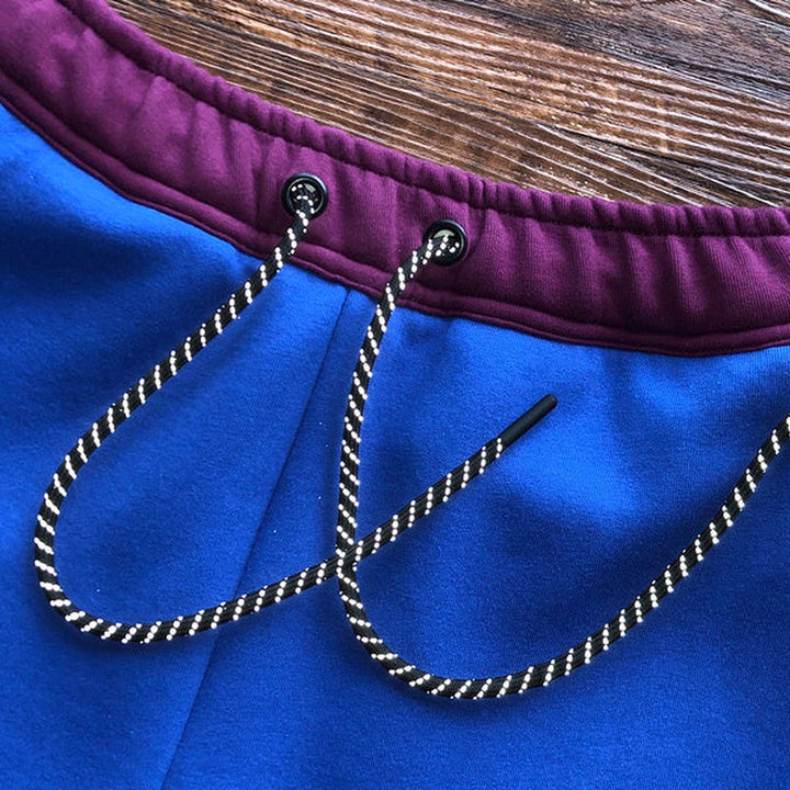NIKE TECH FLEECE PANTS X SANGRIA/GAME ROYAL