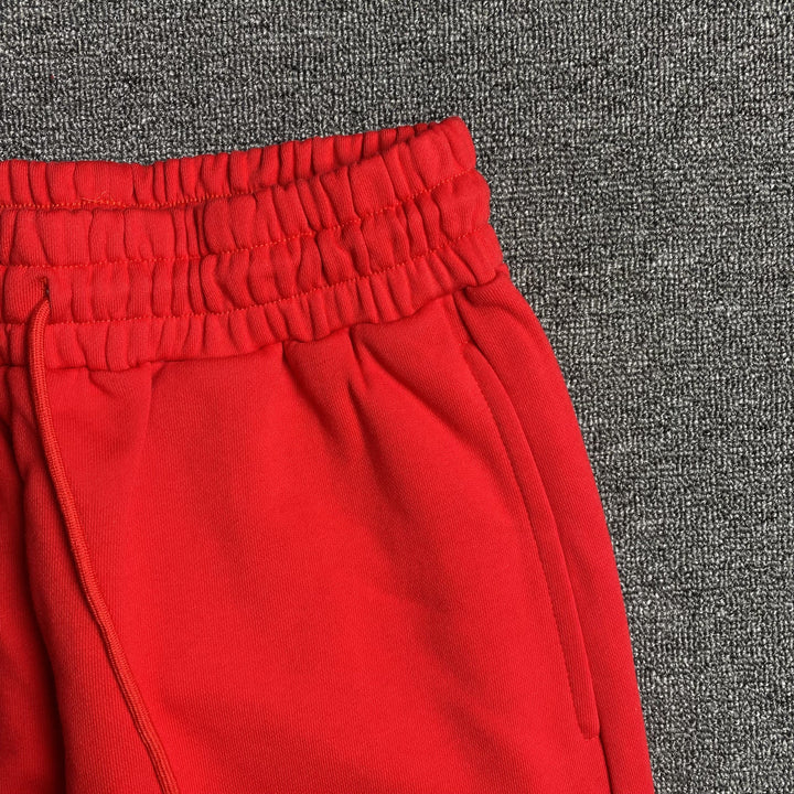 DENIM TEARS COTTON WREATH SWEATPANTS RED