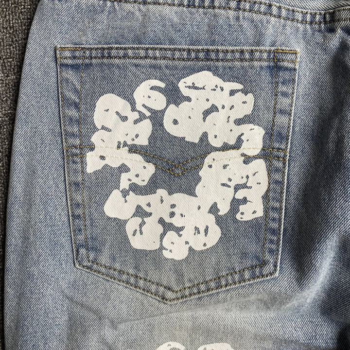 DENIM TEARS X LEVI'S COTTON WREATH JEANS LIGHT WASH